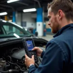 Mechanic using an OBD2 scanner for car diagnostics