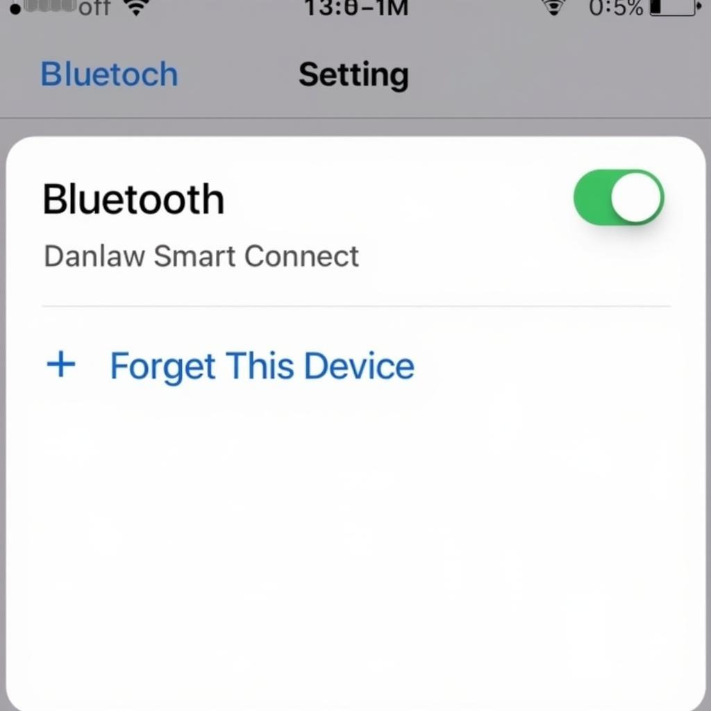 Smartphone screen showing Bluetooth settings with the option to forget a device highlighted