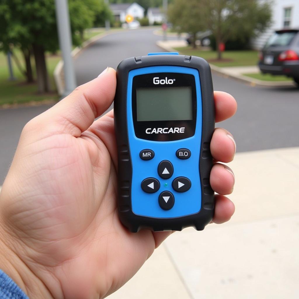 Golo Carcare OBD2 Scanner in Hand