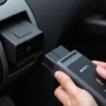 Infiniti OBD2 Scanner Connected to Car