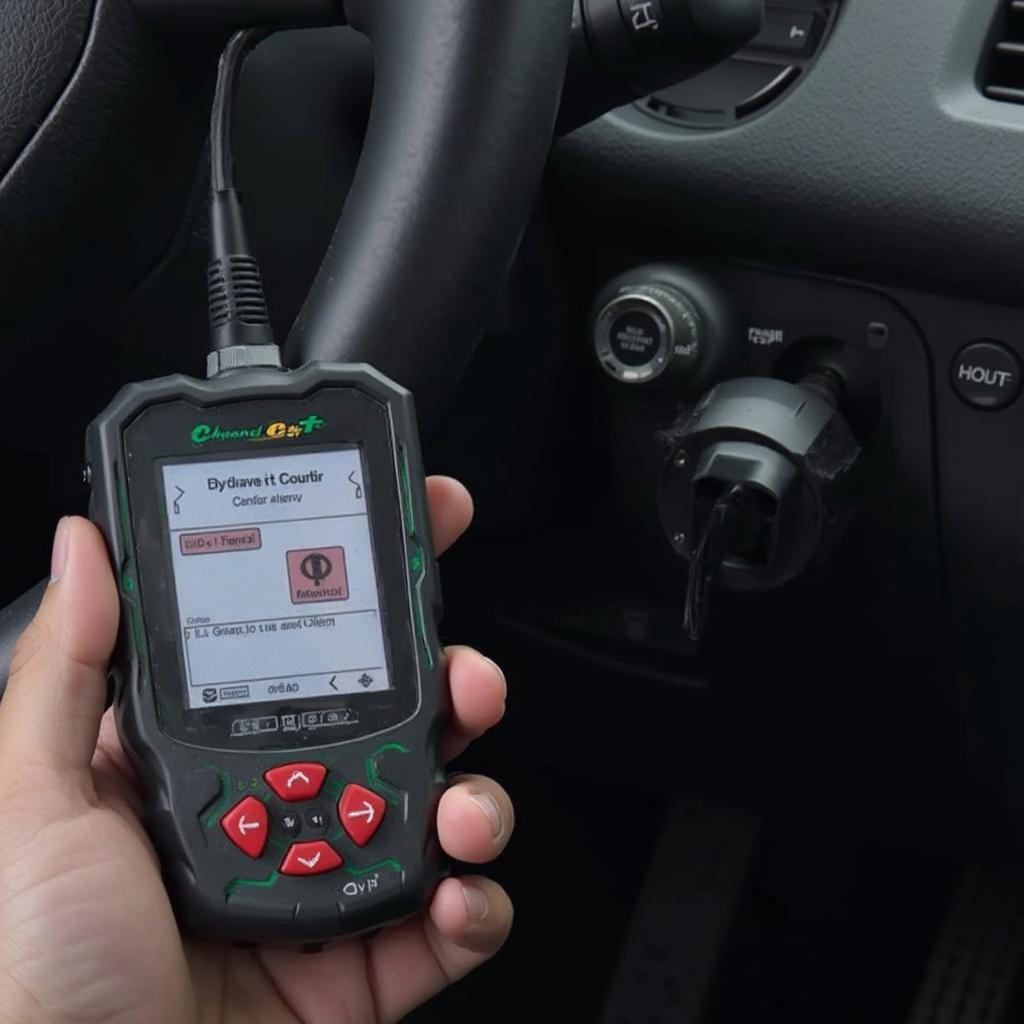 Low-end OBD2 scanner connected to a car's OBD2 port