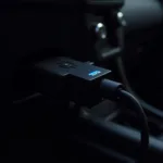 OBD2 Bluetooth Adapter Connected to Car