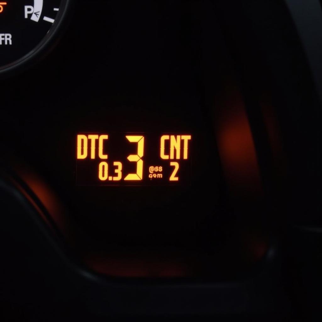 Car dashboard showing check engine light and DTC_CNT