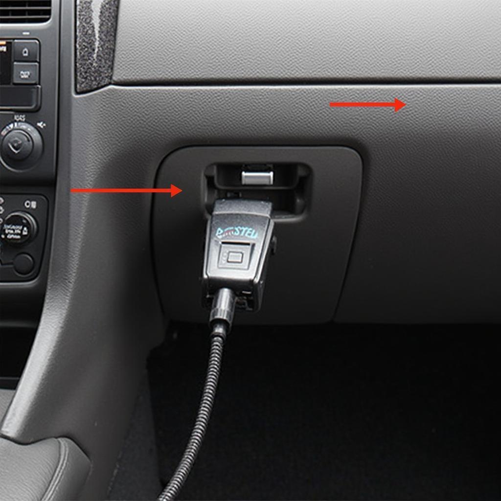 OBD2 Scanner Plugged into Car's OBD Port