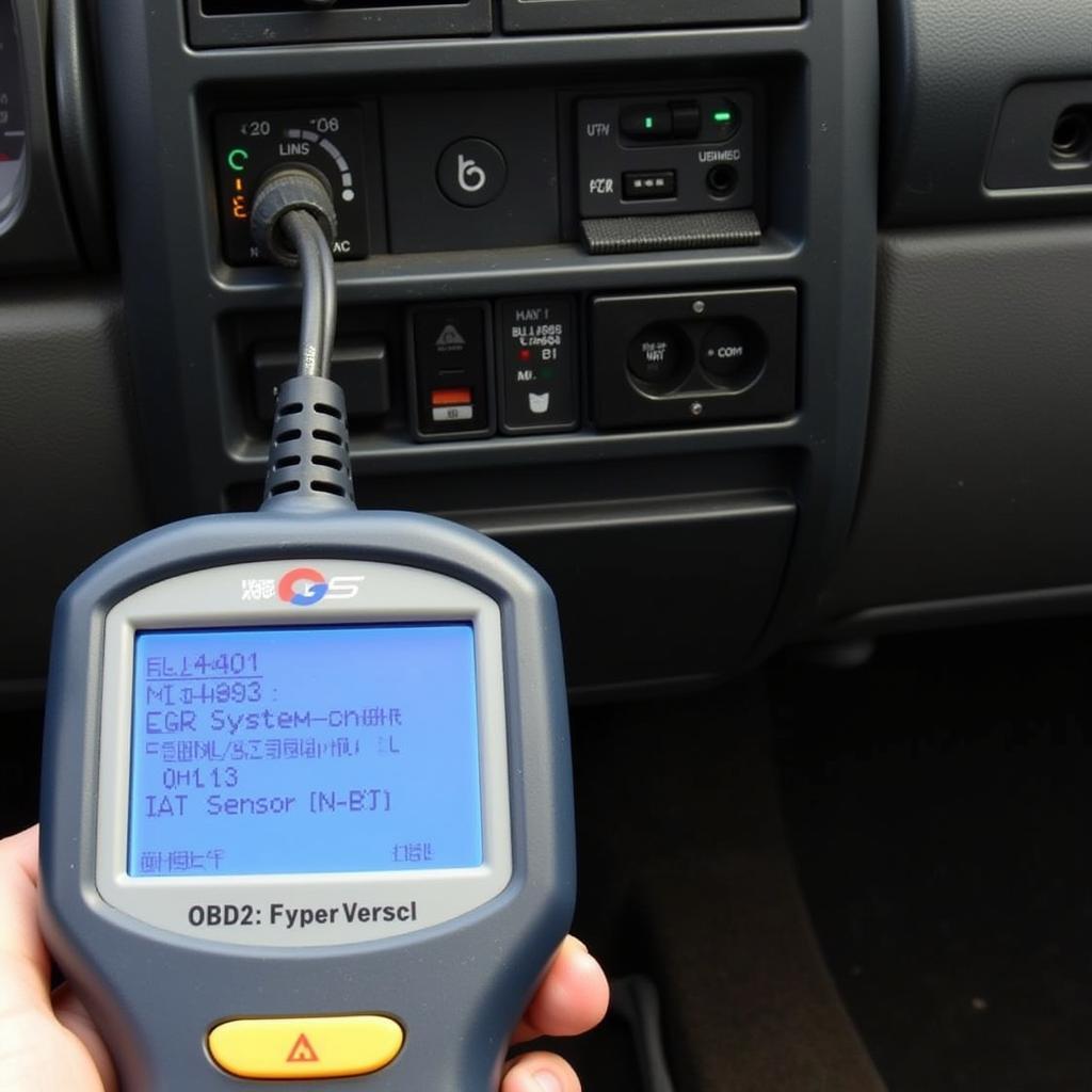 An OBD2 Scanner Displaying Diagnostic Trouble Codes on a 1995 Ford F150