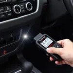 Panlong Mini OBD2 Scanner Connected to Car