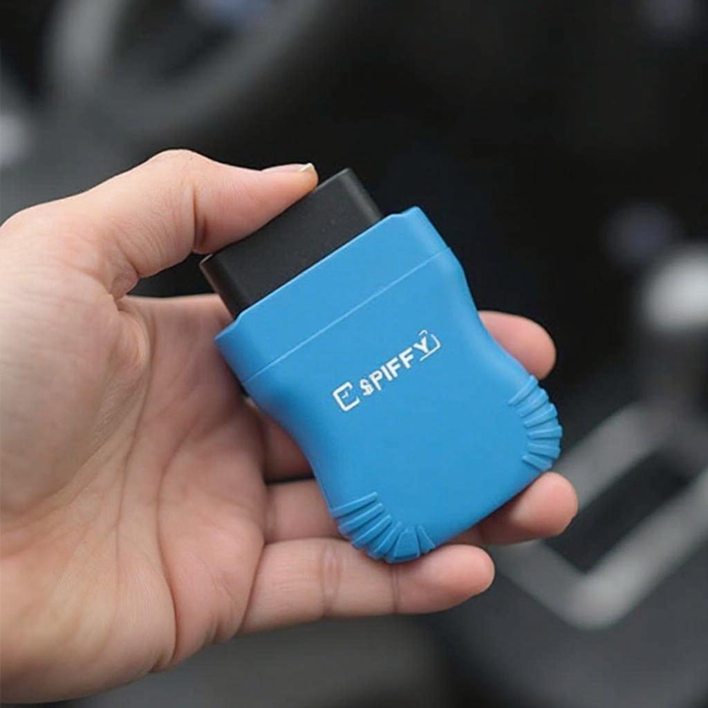 Spiffy Blue OBD2 Scanner Held in Hand