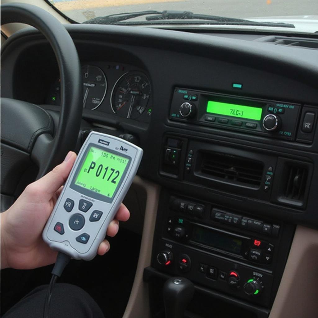 OBD2 scanner displaying the P0172 code on a 1999 Volvo V70