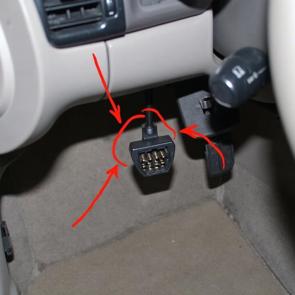 2004 Subaru Legacy OBD2 Port Location under the dashboard