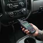 OBD2 Scanner Displaying the P0521 Code on a 2011 Chevy Silverado