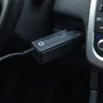 Bluetooth OBD2 Driver Plugged into Car's OBD2 Port