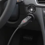 OBD2 mini USB cable plugged into a car's OBD2 port