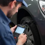 Mechanic Checking OBD2 Port Connection