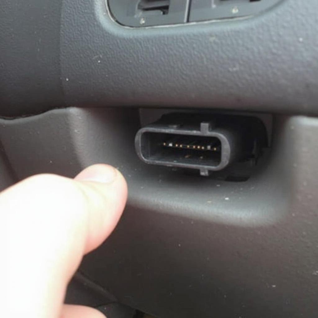 OBD2 port location in a 1998-2002 Chevy Prism