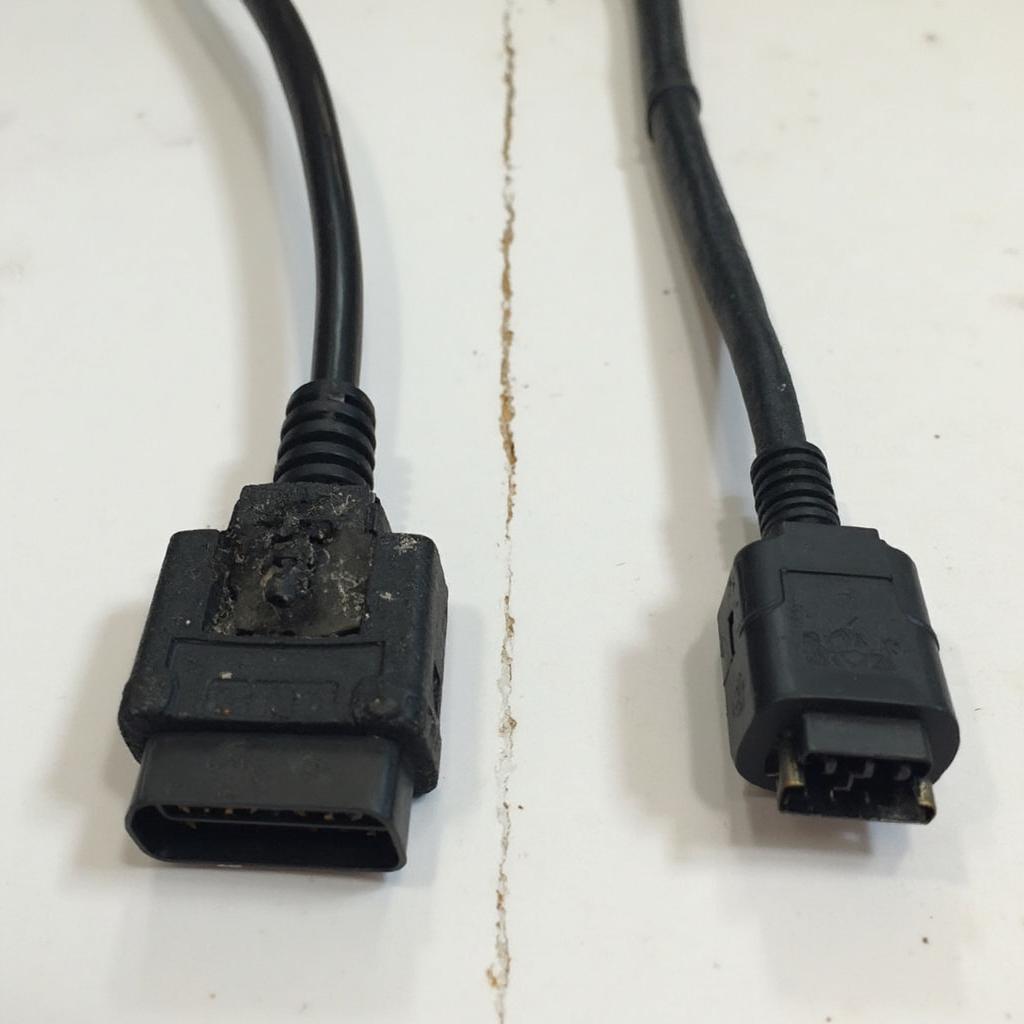 Damaged vs. New OBD2 Cable