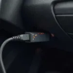 Ecofuel OBD2 Device Plugged into a Car's OBD2 Port