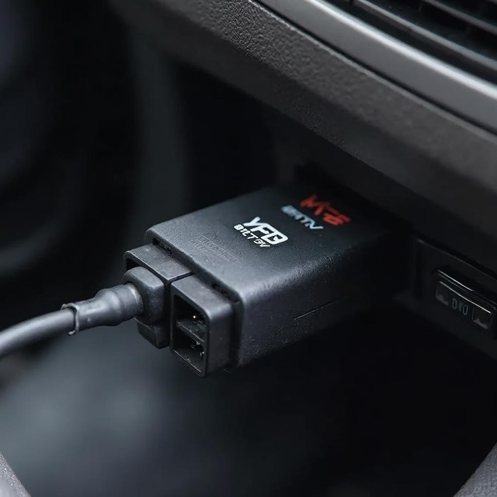 ELM327 Bluetooth Interface OBD2 Connected to Car