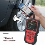 ELM327 WiFi Bluetooth OBD2 Scanner Connected to Car