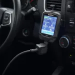 Innova OBD2 Diagnostic Tool connected to a car's OBD2 port