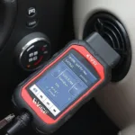 KW808 OBD2 Scanner Connected to a Car's OBD2 Port