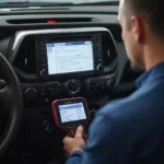 Mechanic Diagnosing a Toyota RAV4 Using an OBD2 Scanner