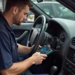 Mechanic Diagnosing a 1995 Thunderbird Using a Dealer Scan Tool