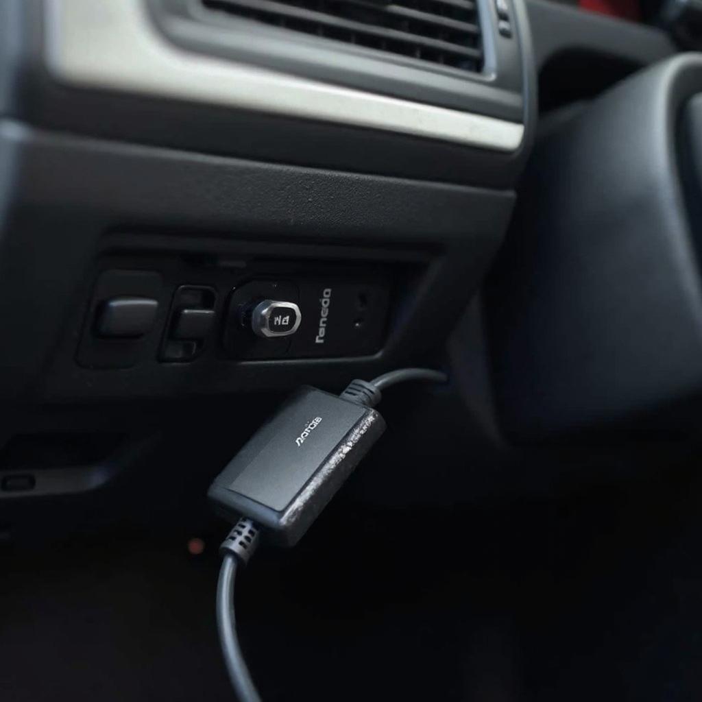 Nonda OBD2 Free device plugged into a car's OBD2 port