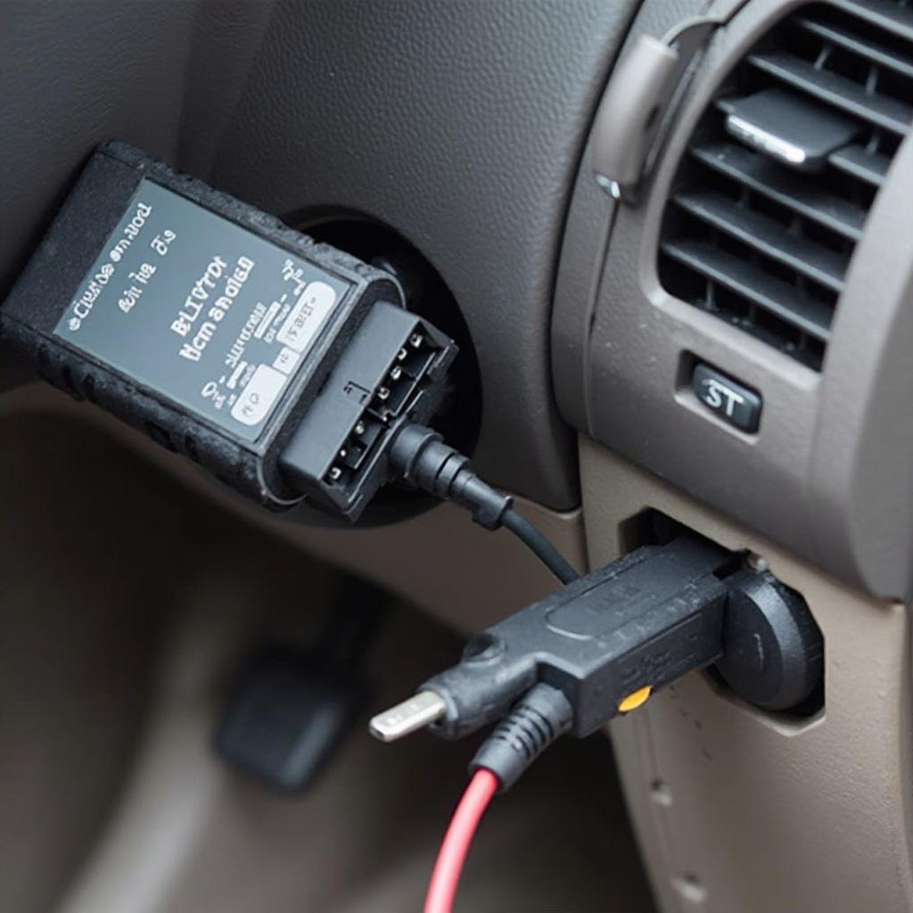 OBD2 Adapter Connected to a Car's OBD2 Port