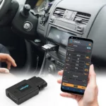 OBD2 BLE Adapter Connected to Smartphone