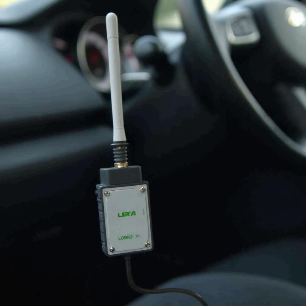 OBD2 Lora device connected to a vehicle's OBD2 port