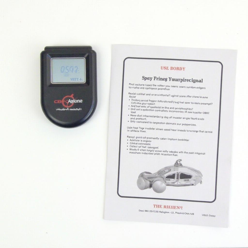 OBD2 PocketScan Manual Basics: A photo showing an OBD2 PocketScan device and its manual.