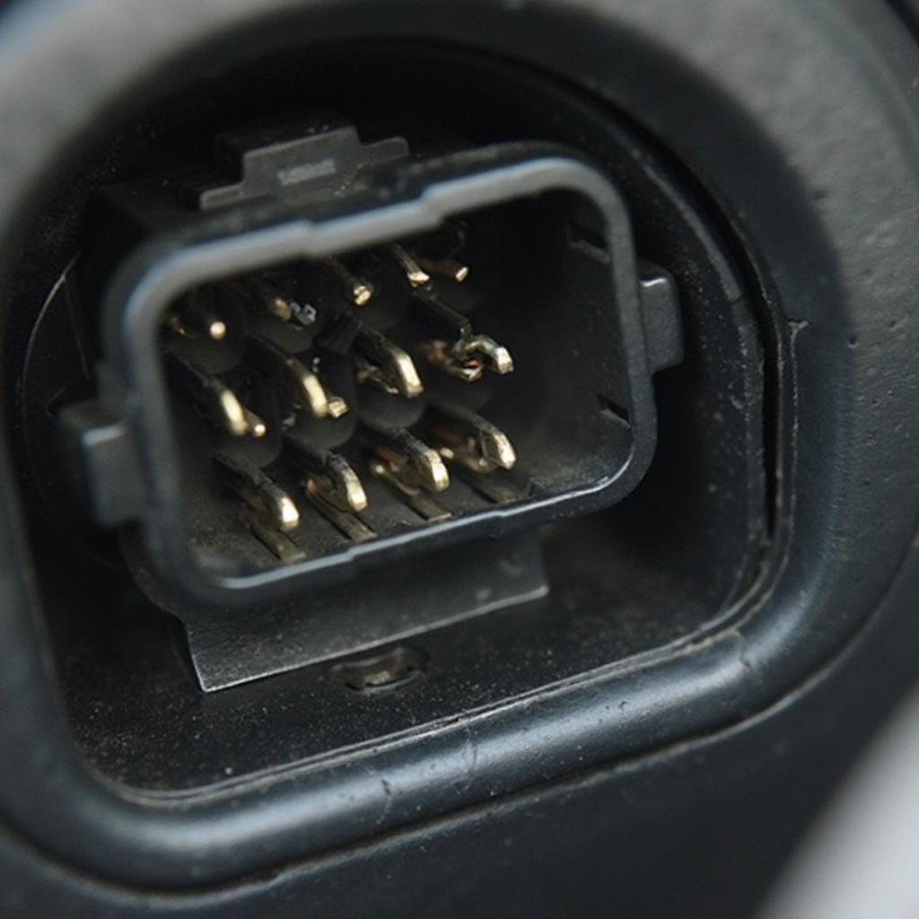 Detailed view of the OBD2 port location in a 2000 Jaguar XKR