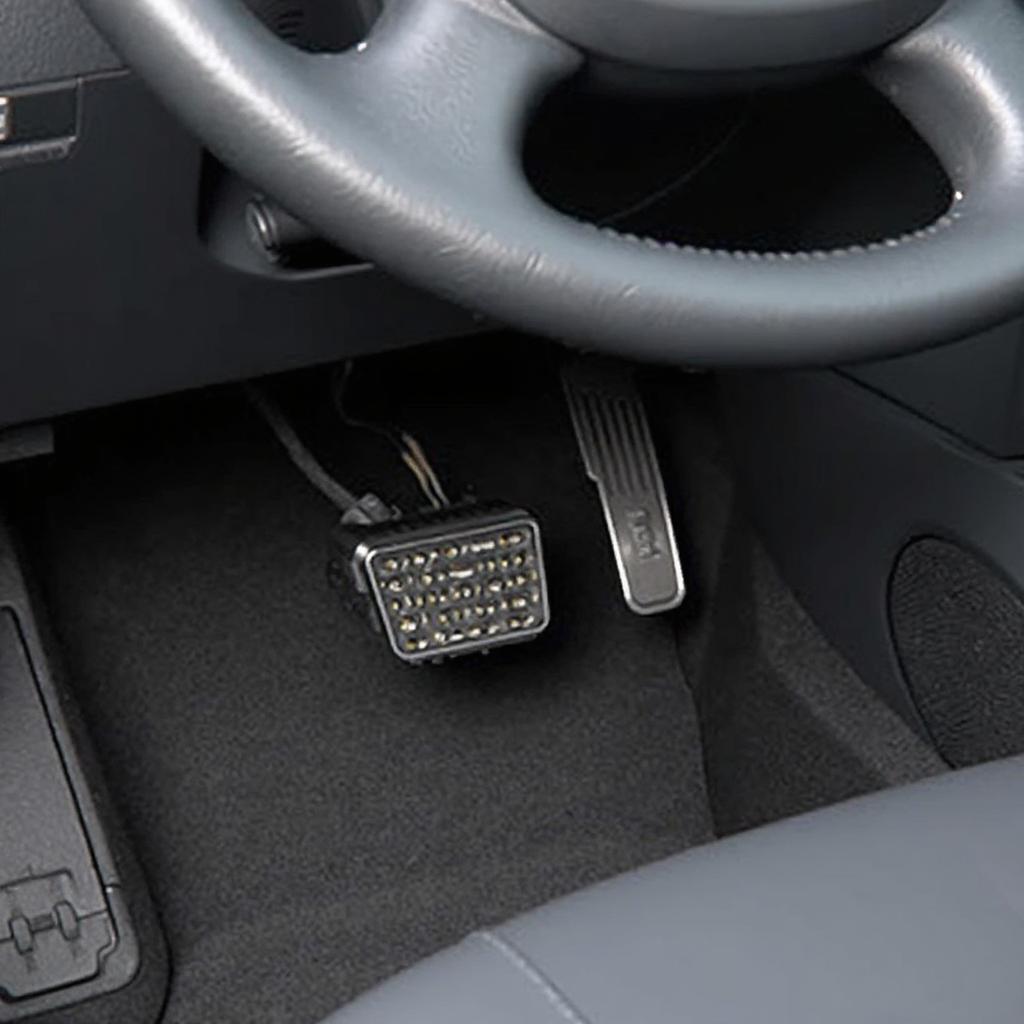 OBD2 Port Location Under Steering Wheel