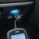 OBD2 Scanner Connected to the Port