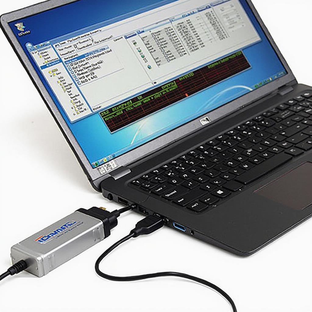 OBD2 scanner connected to a Windows 7 laptop via USB cable.