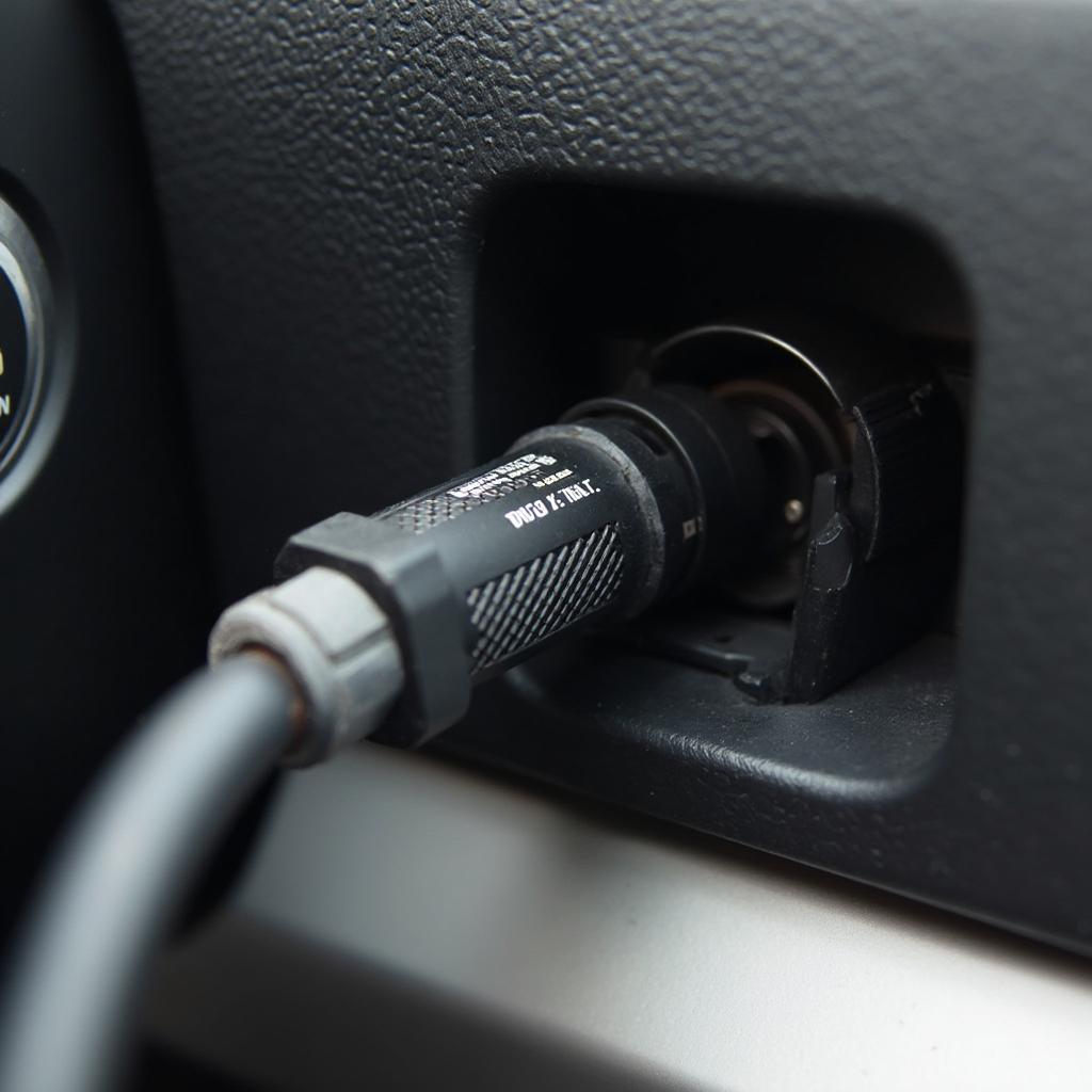 Ross-Tech VCDS Cable Connected to a Car's OBD2 Port