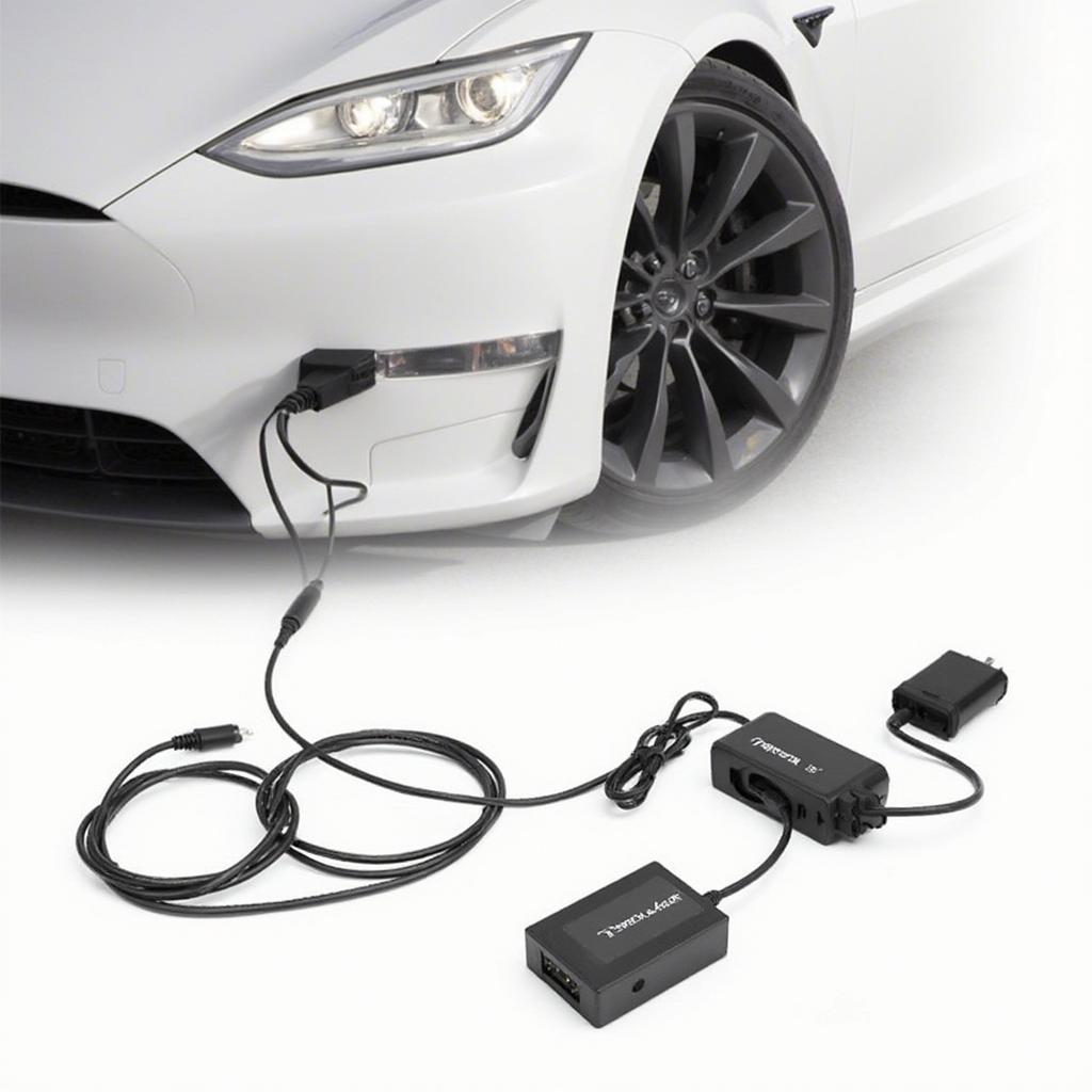 Tesla Diagnostic Adapter Connected to Aftermarket Device