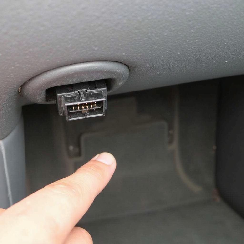 OBD2 Port Location in a 2006 Hyundai Tiburon