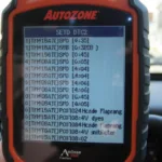 An Autozone OBD2 scanner displaying diagnostic trouble codes