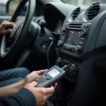 Bi-directional OBD2 scanner connected to a car's OBD2 port, displaying diagnostic information on its screen.