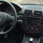 Locating the OBD2 Port on a BMW E90