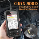 DMX906S OBD2 scanner plugged into a car's OBD2 port