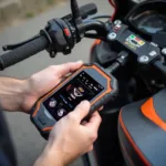 Duke 690 OBD2 Scanner in Use