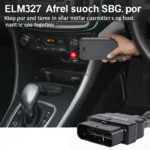 ELM327 Bluetooth Adapter connected to OBD2 port