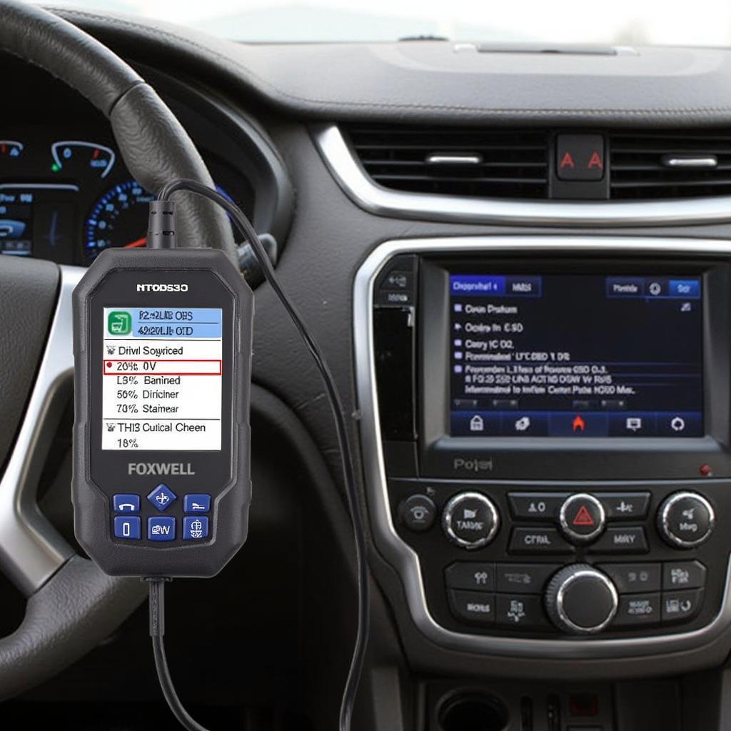 Foxwell NT301 OBD2 scanner plugged into a Chevrolet Traverse's OBD2 port.