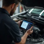 A mechanic uses an OBD2 scanner to diagnose a car's problem.