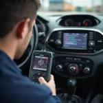 Mechanic Diagnosing a Car with an Oxgord OBD2 Scanner