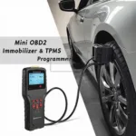 Mini OBD2 Immobilizer TPMS Key Programmer in Action