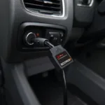 Mongoose OBD2 Cable Connected to Car OBD2 Port