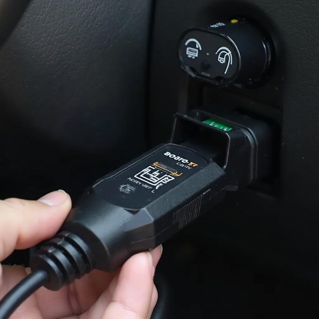 OBD2 adapter plugged into a car's OBD2 port.